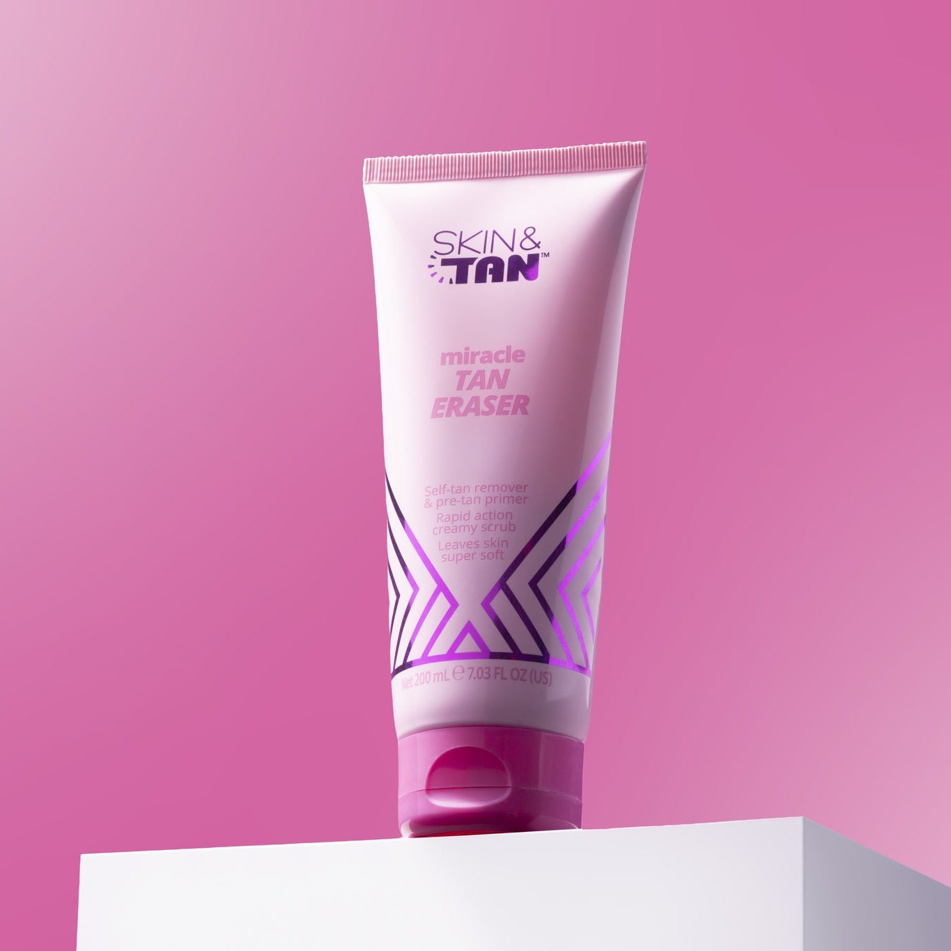 Miracle Tan Eraser self-tan remover on a pink studio set